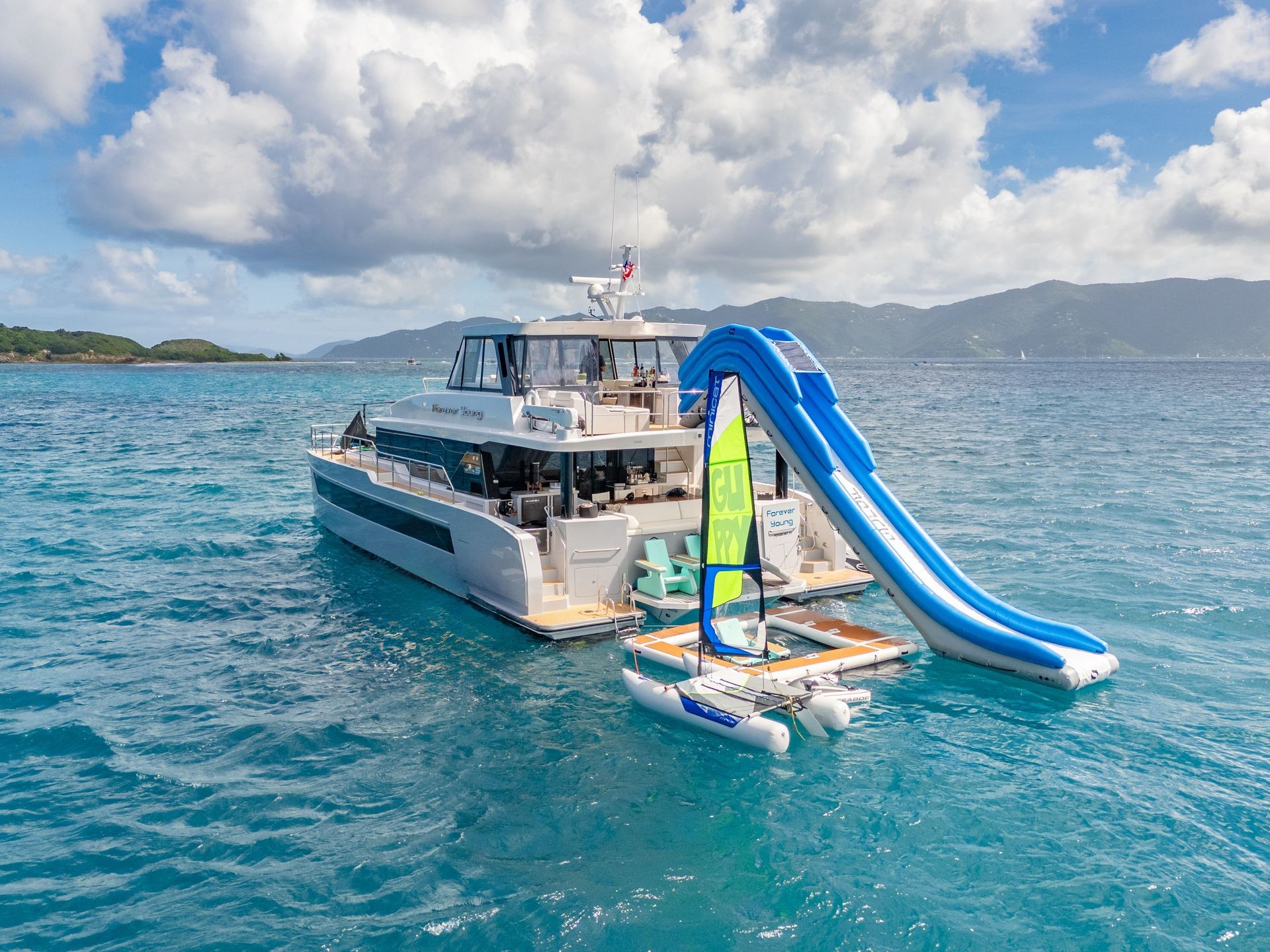 Crewed yacht catamaran for charter Forever Young